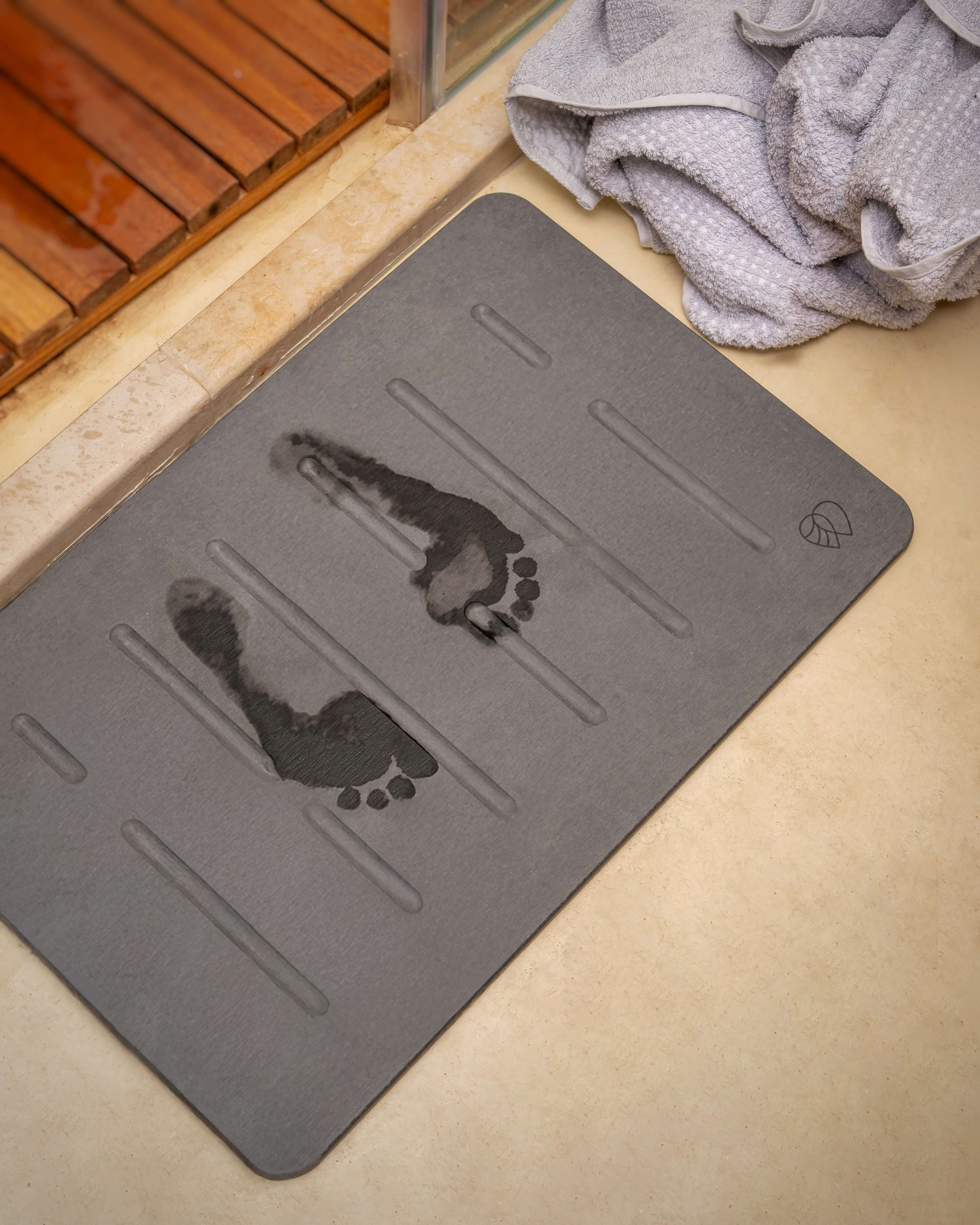 Footprints on bath mat